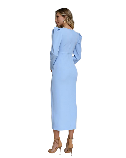 Woman wearing a light blue dress with a belt on a white background