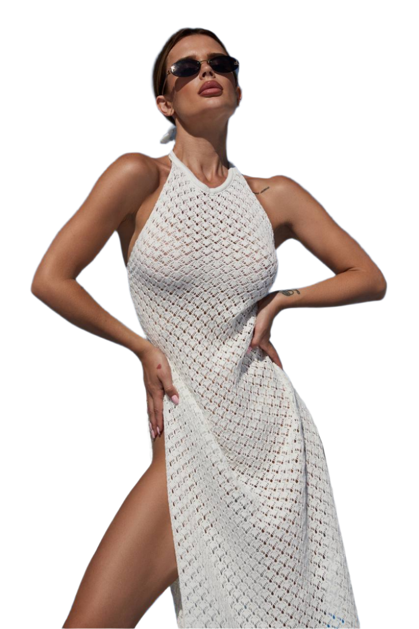 Woman wearing a white woven dress with sunglasses on a white background