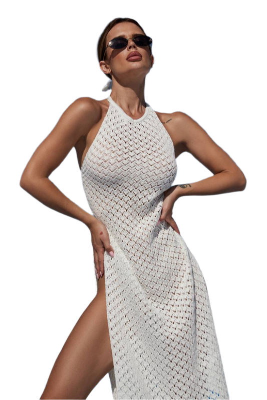 Woman wearing a white woven dress with sunglasses on a white background