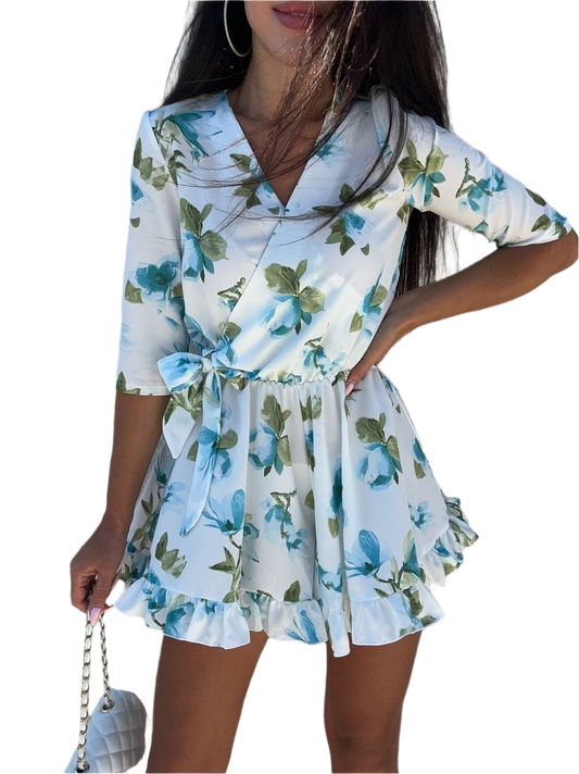 Woman wearing a floral dress with a white background