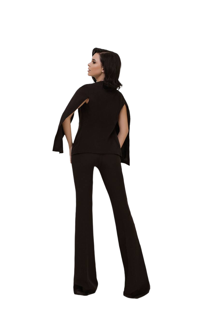 Person wearing a black outfit with cut-out design on a white background