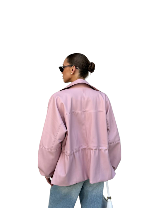 Person wearing a pink jacket and sunglasses on a white background