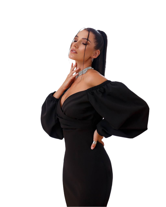 Woman wearing a black off-shoulder dress with puffed sleeves on a white background