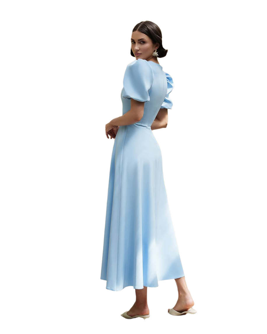 Woman wearing a light blue dress on a white background