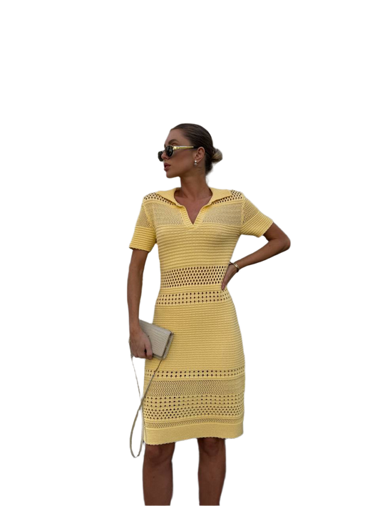 Woman wearing a yellow dress with a white background