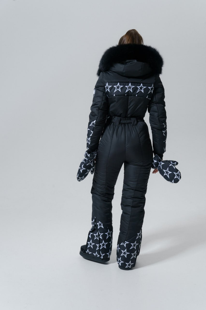 Black snowsuit with star patterns on a white background