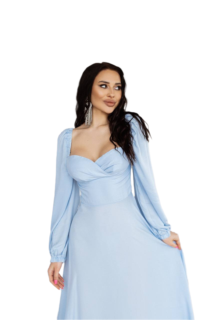 Woman wearing a light blue dress with long sleeves on a white background