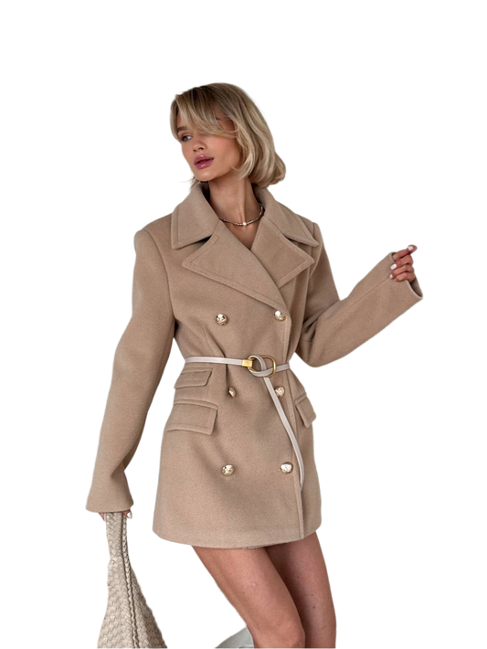 Woman wearing a beige trench coat on a white background