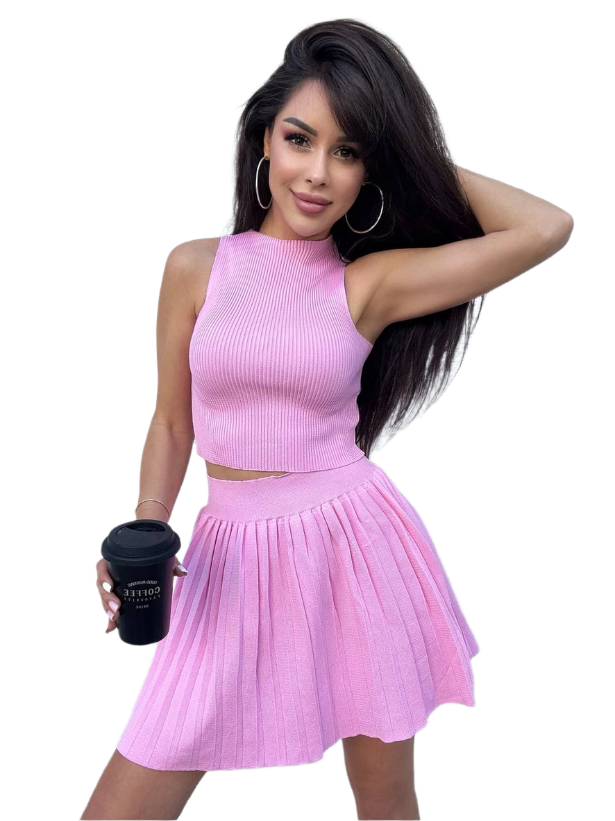 Woman wearing a pink outfit holding a black cup on a white background