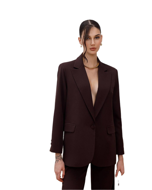 Woman wearing a brown blazer on a white background