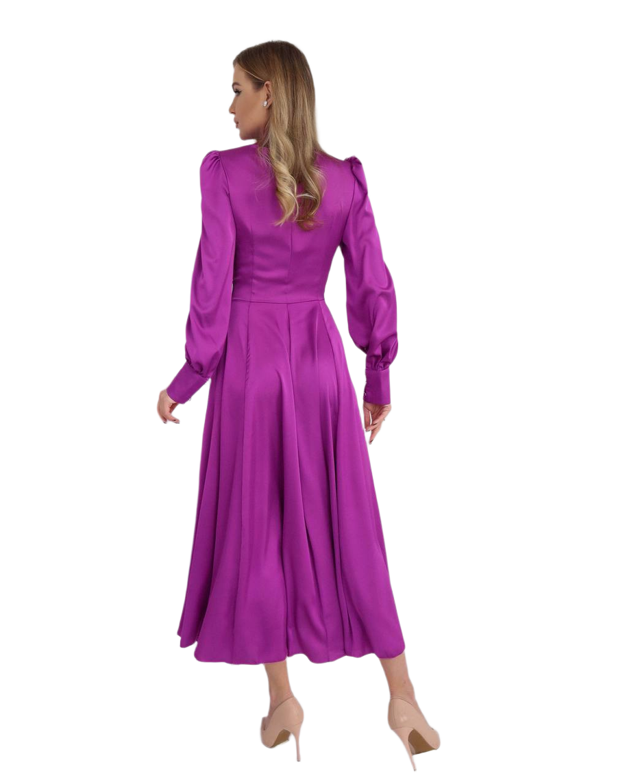 Purple dress worn by a model on a white background