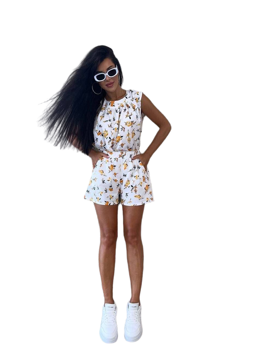 Woman wearing a floral outfit on a white background