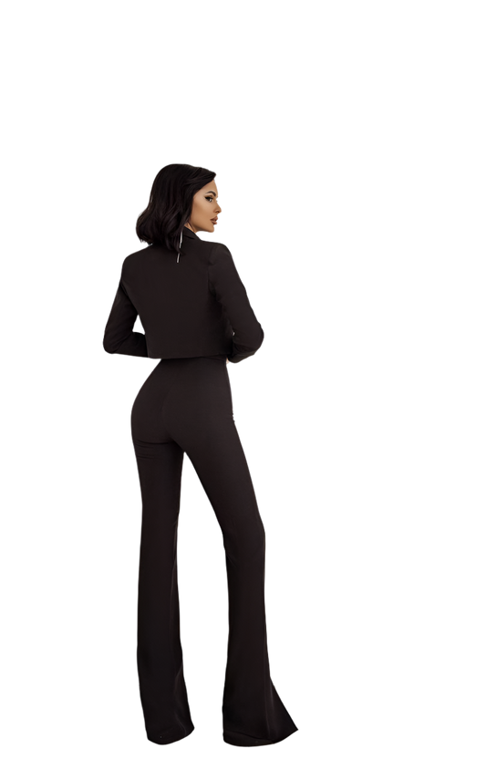Woman wearing a black outfit with flared pants on a white background