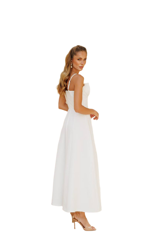 Woman wearing a white dress on a white background