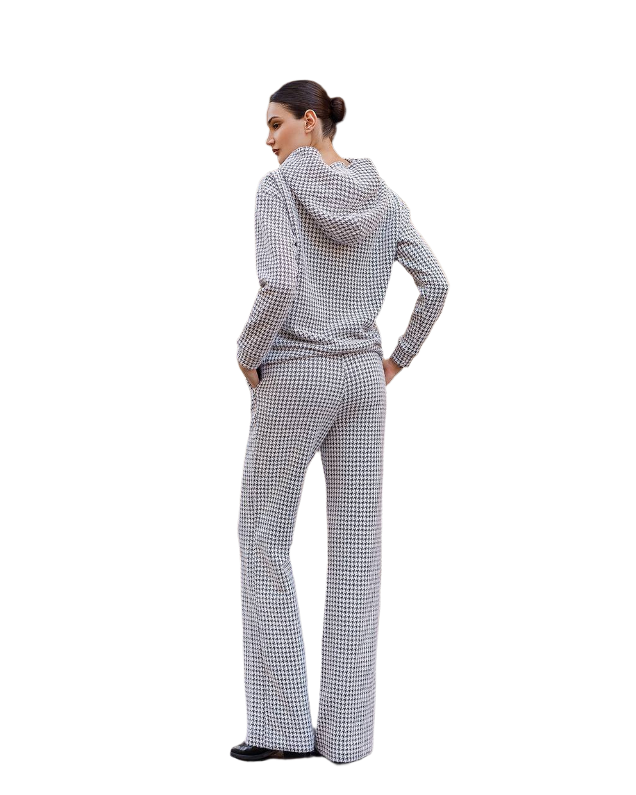 Person wearing a checkered outfit on a white background