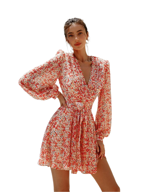 Woman wearing a red and white floral dress on a white background