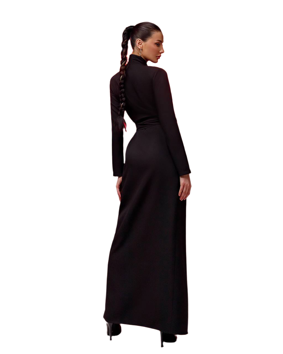 Woman wearing a long black dress on a white background