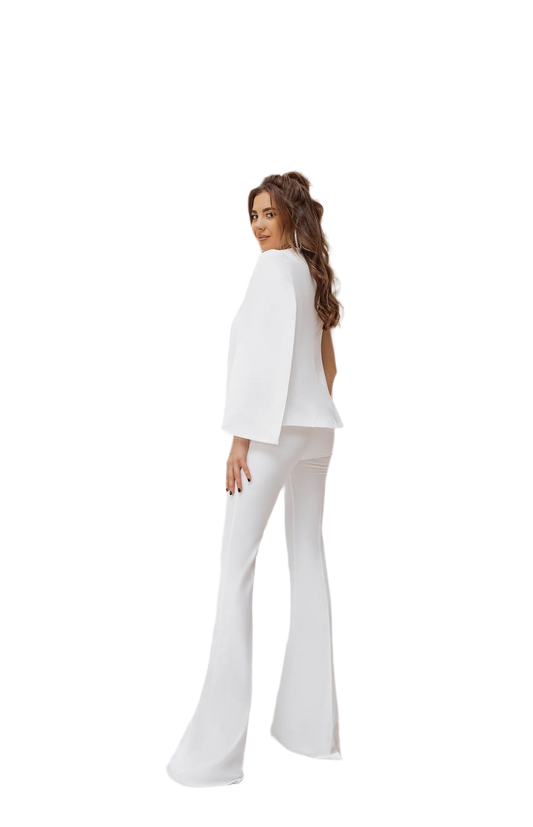 Woman wearing a white outfit with flared pants on a white background