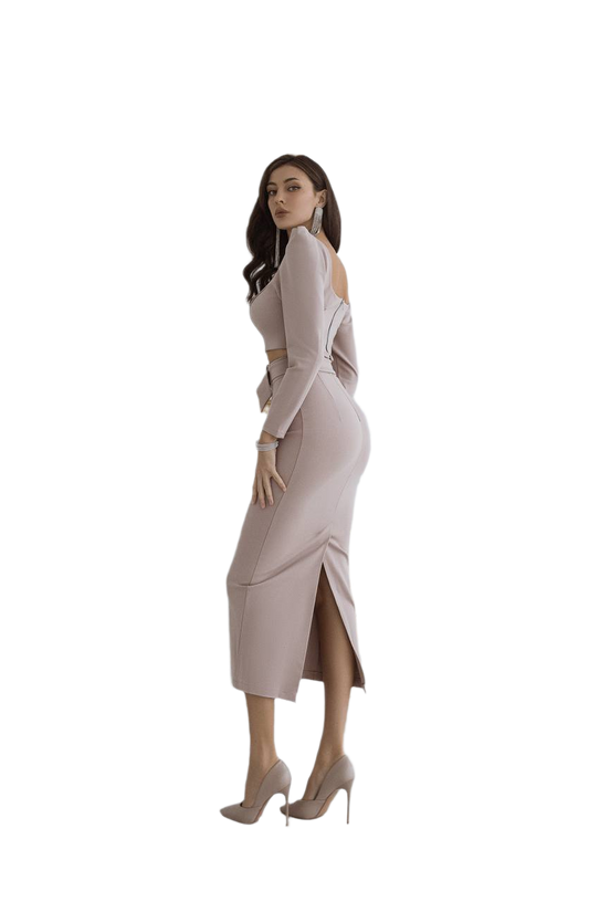 Woman wearing a light pink dress with cut-out shoulders on a white background