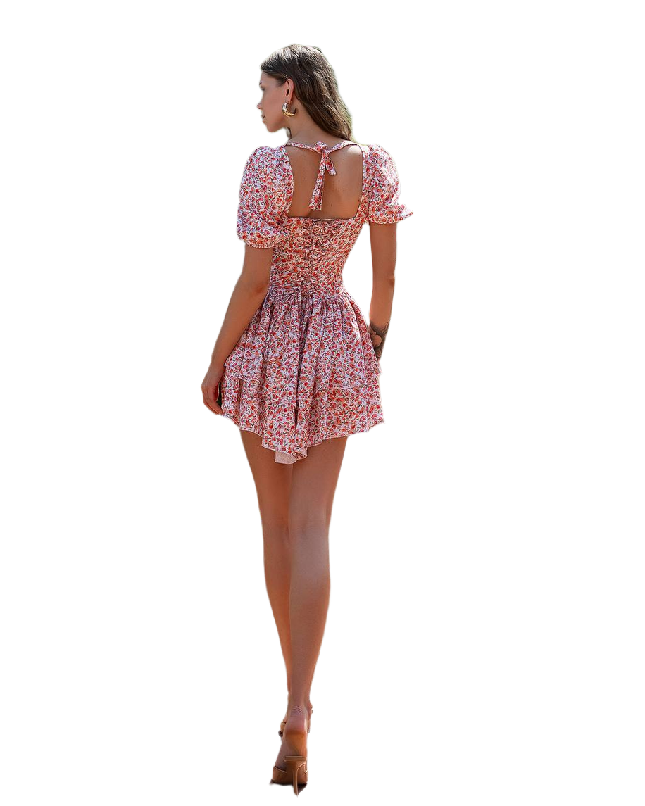 Woman wearing a floral dress on a white background