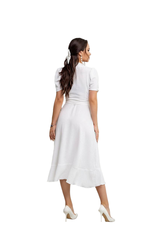 Woman wearing a white dress on a white background