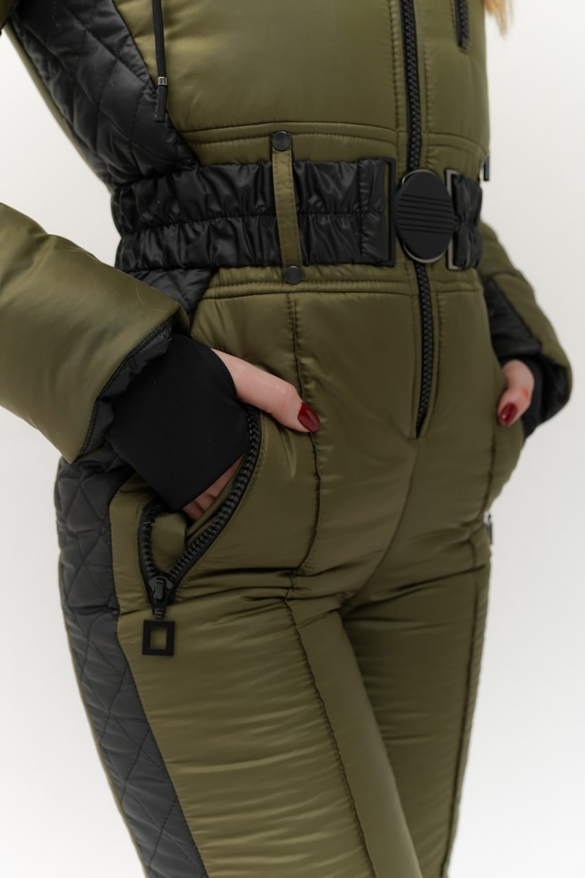 Green and black winter suit with a belt on a white background