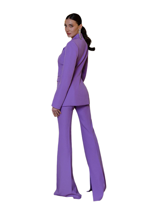 Woman wearing a purple suit on a white background