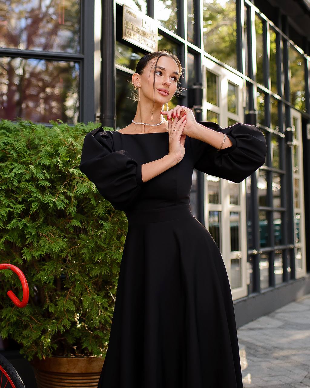 Elegant Midi Dress with Puff Sleeves and Cutout Back in Black