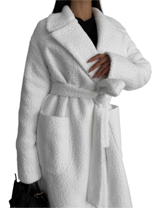 White robe worn by a person on a white background