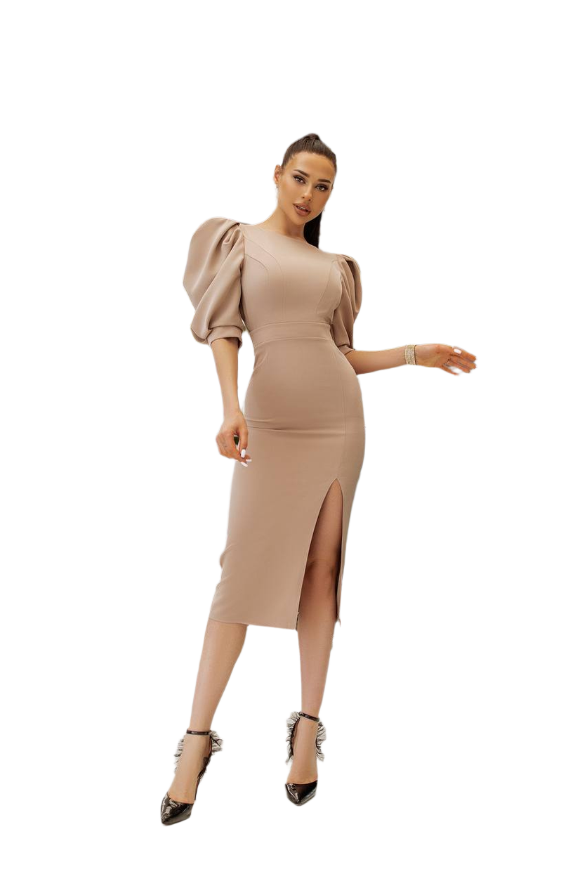 Woman wearing a beige dress with puffed sleeves on a white background