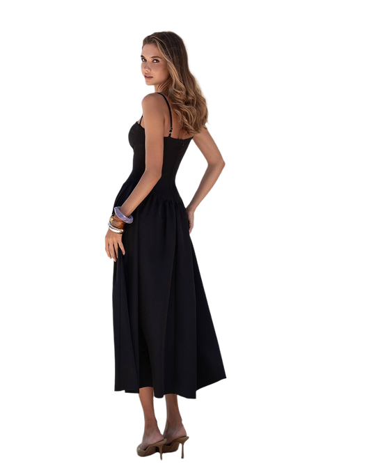 Woman wearing a black dress on a white background