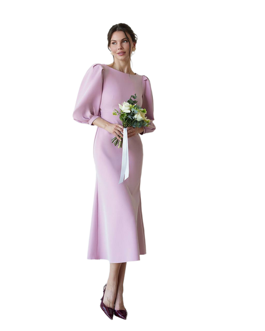 Woman in a pink dress holding flowers on a white background
