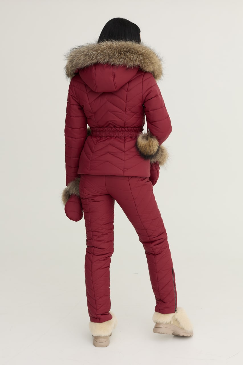 Red winter coat with fur trim on a white background