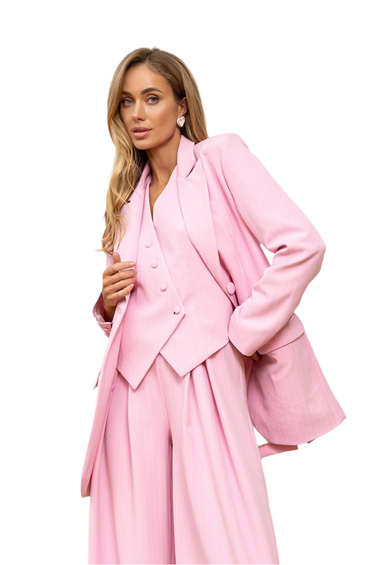 Woman wearing a pink suit on a white background