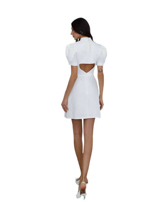 White dress with cut-out back on a white background
