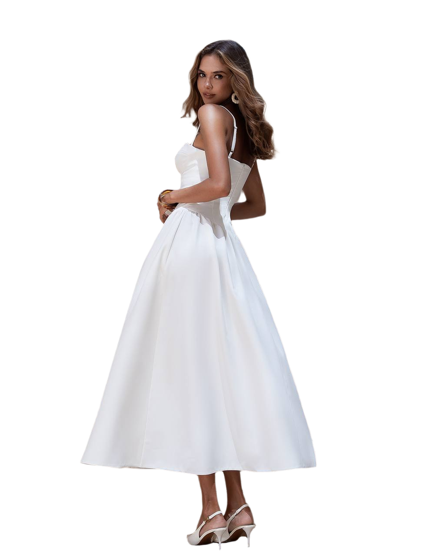 Woman wearing a white dress on a white background