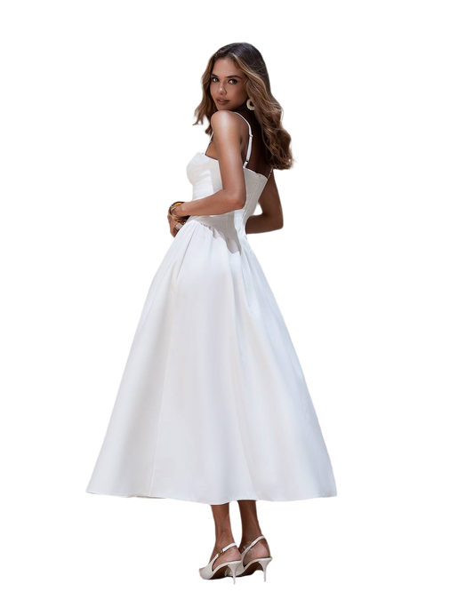 Woman wearing a white dress on a white background