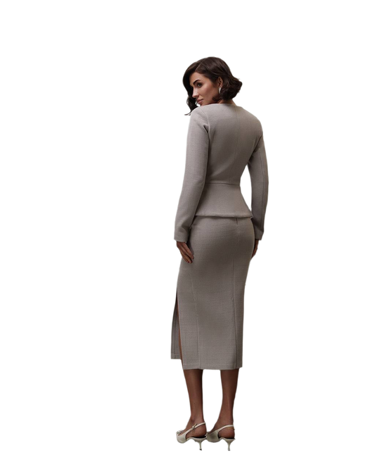 Woman wearing a gray suit on a white background