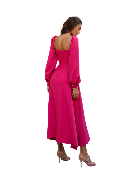 Woman wearing a bright pink dress with long sleeves on a white background