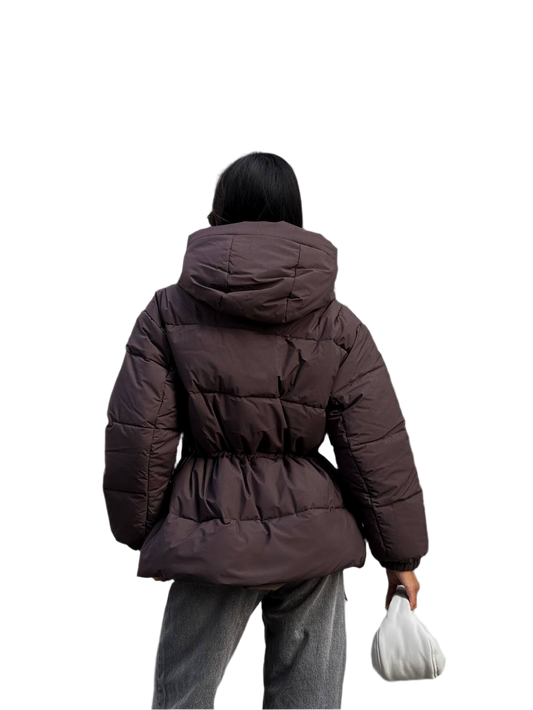 Person wearing a brown puffer jacket on a white background