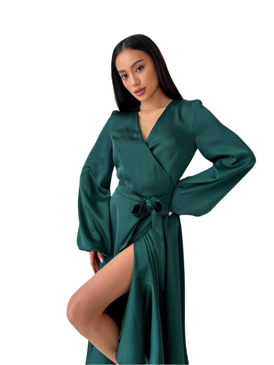 Woman wearing a green satin robe on a white background