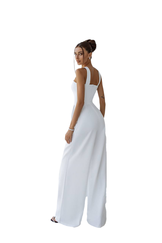 Woman wearing a white sleeveless jumpsuit on a white background