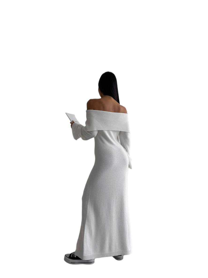 Woman wearing a white off-shoulder dress on a white background