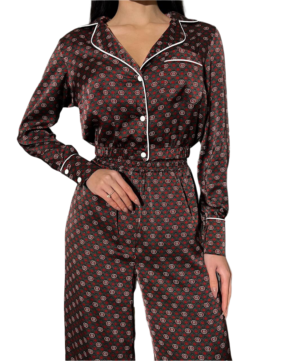 Patterned pajama set worn by a person on a white background