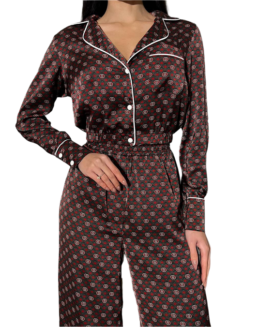 Patterned pajama set worn by a person on a white background