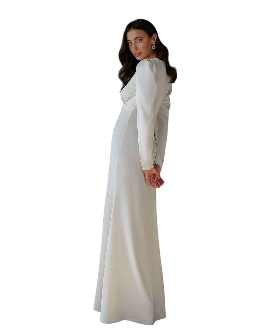 Woman wearing a long white dress on a white background