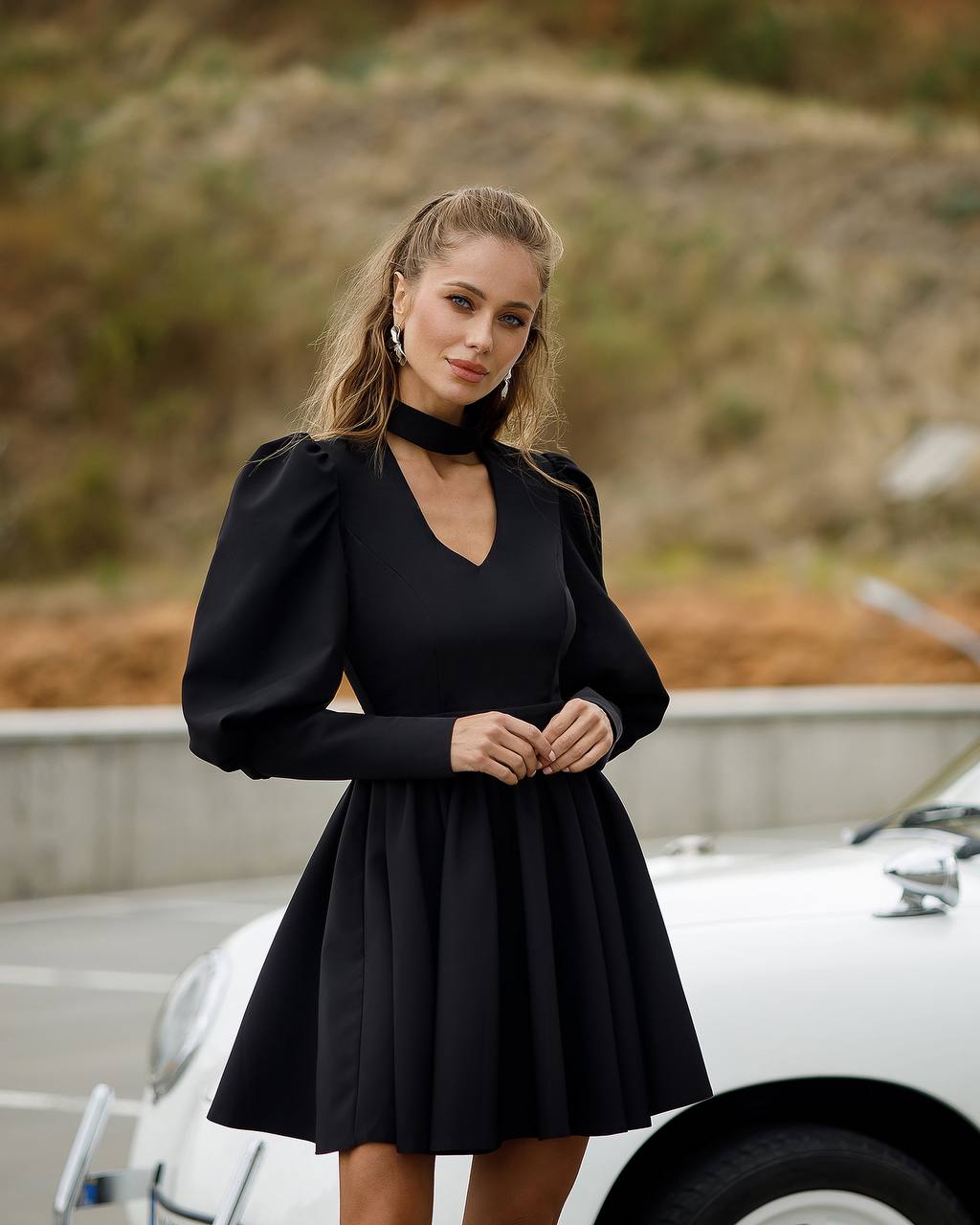 Elegant Black Mini Dress with Full Skirt and Puff Sleeves