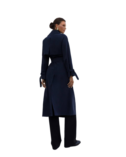 Woman wearing a navy blue coat on a white background