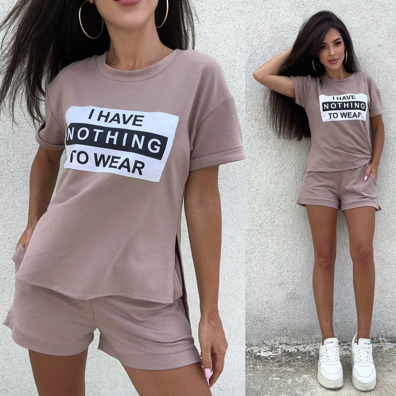 Woman wearing a brown t-shirt and shorts set with 'I Have Nothing To Wear' text, standing against a light gray wall.