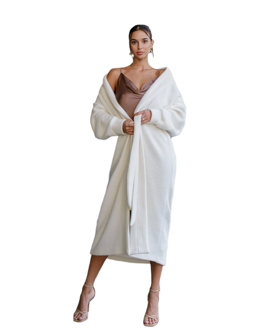 Woman wearing a white wrap dress on a white background